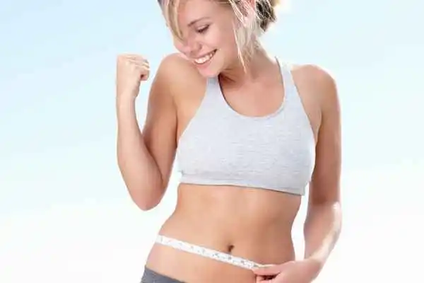 woman happy after fat reduction treatment Royal Tunbridge Wells